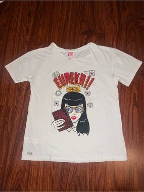 Lacoste White Graphic Tee with 'EUREKA!!' Retro Girl Print